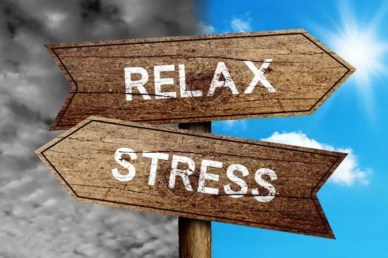 Road sign pointing to relax and stress 