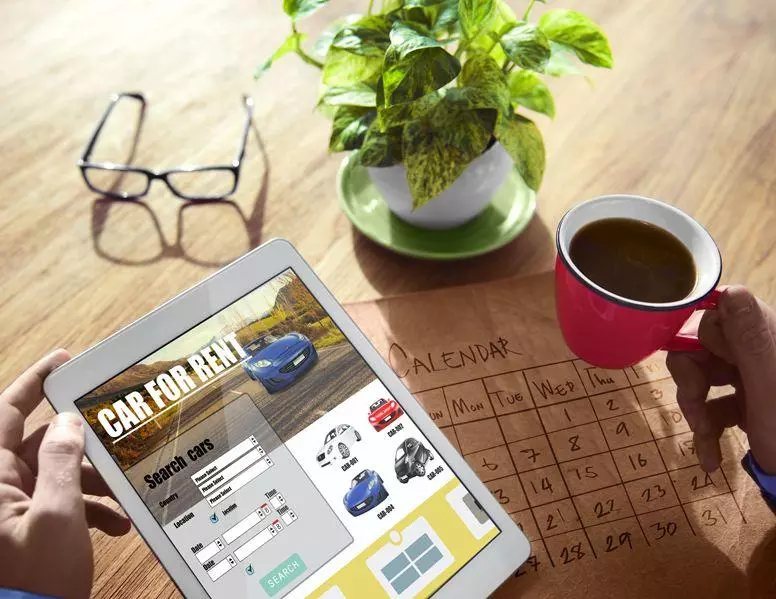 Searching for car hire on a tablet