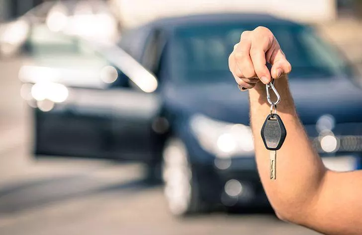 Businessman holding car keys