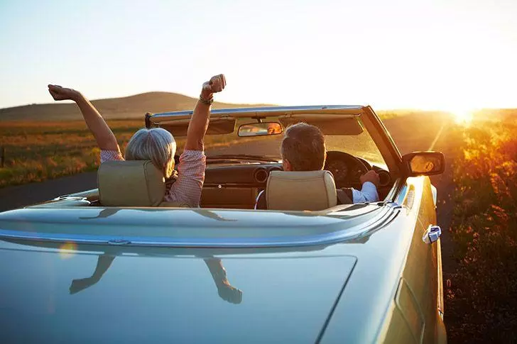 Elderly couple in hire car