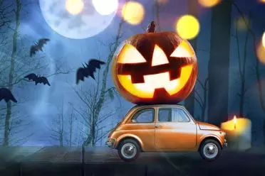 Halloween pumpkin on car