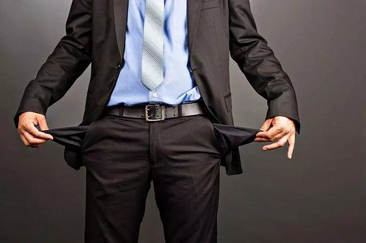 Man with empty pockets