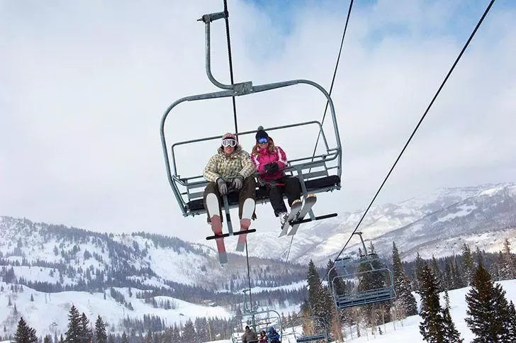 Skiers on ski lift