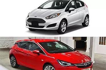 Silver Ford and red Vauxhall Astra